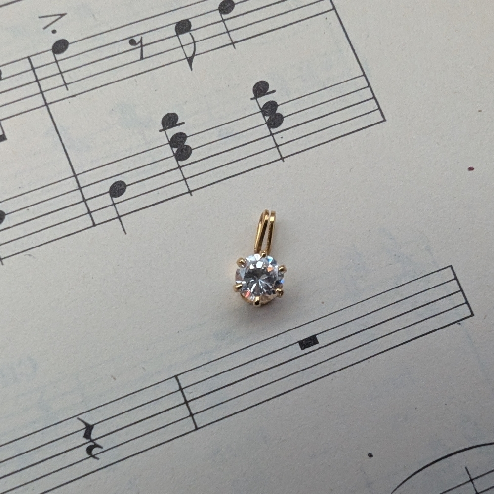 Gold and Silver Pendant with Clear Gemstone